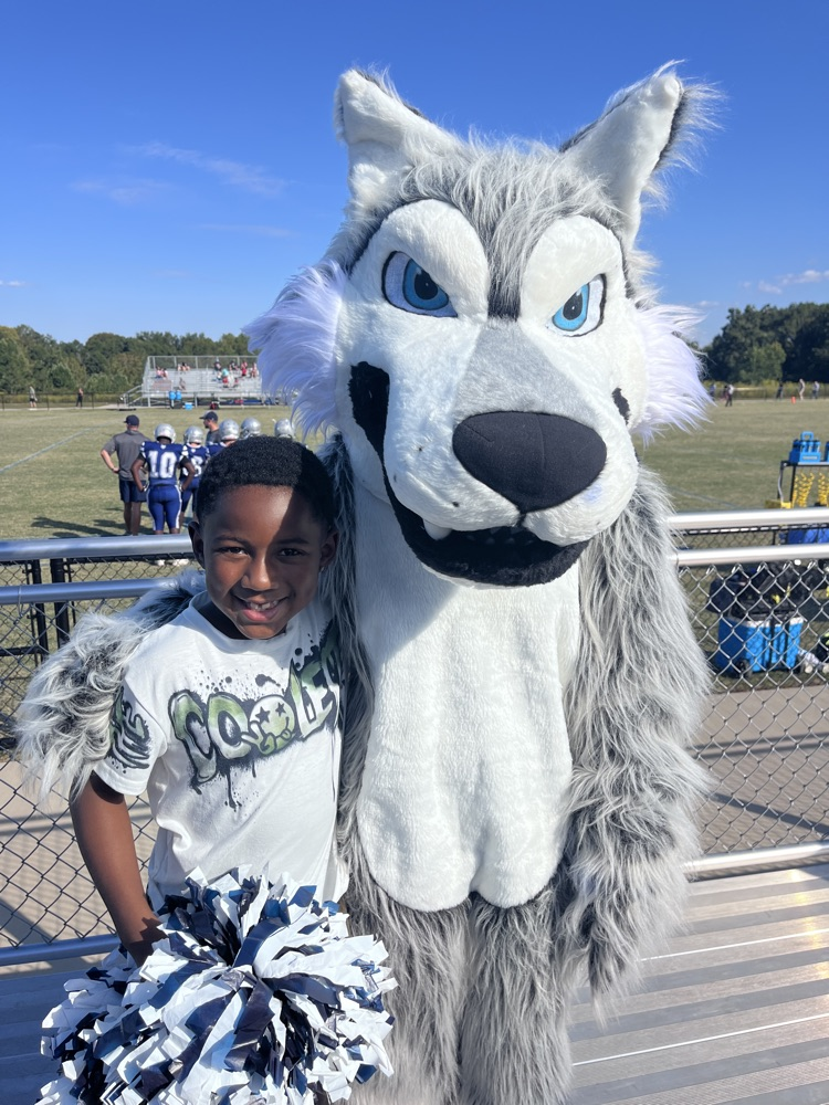 teacher or kids  with the mascot 