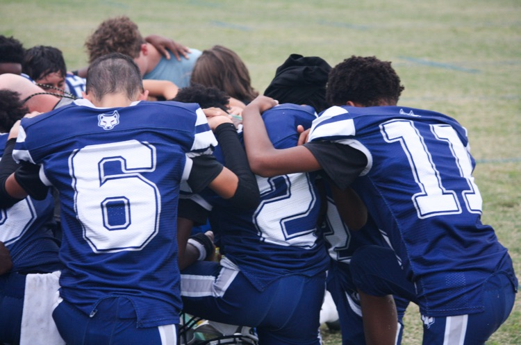 boys in a huddle 