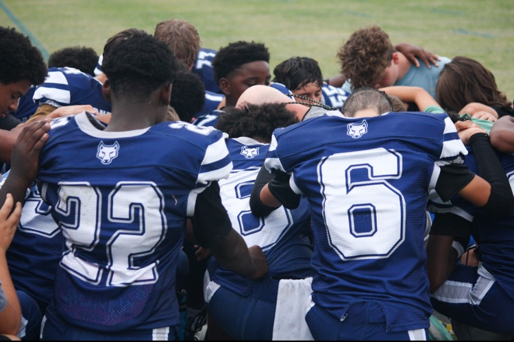 boys in a huddle 