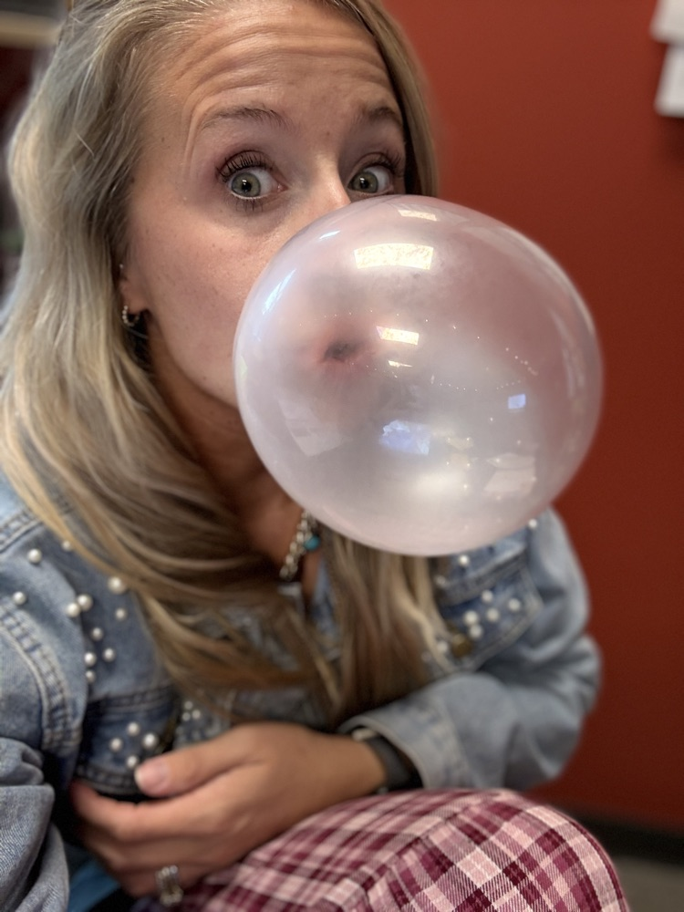 teacher blowing a bubble