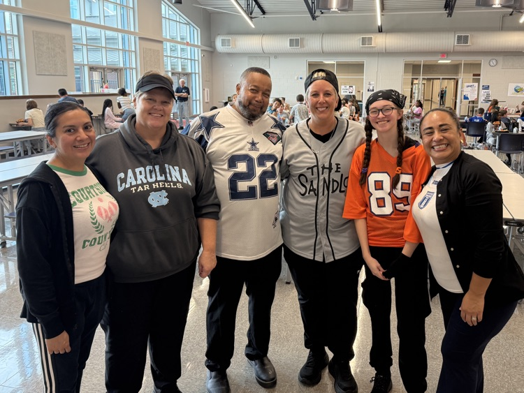 cafeteria staff dressed in team gear