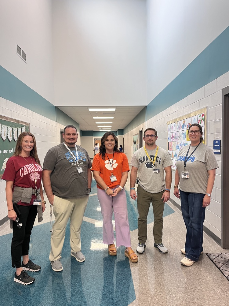 teachers dressed in team gear