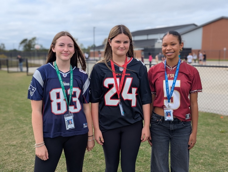 students dressed in team gear
