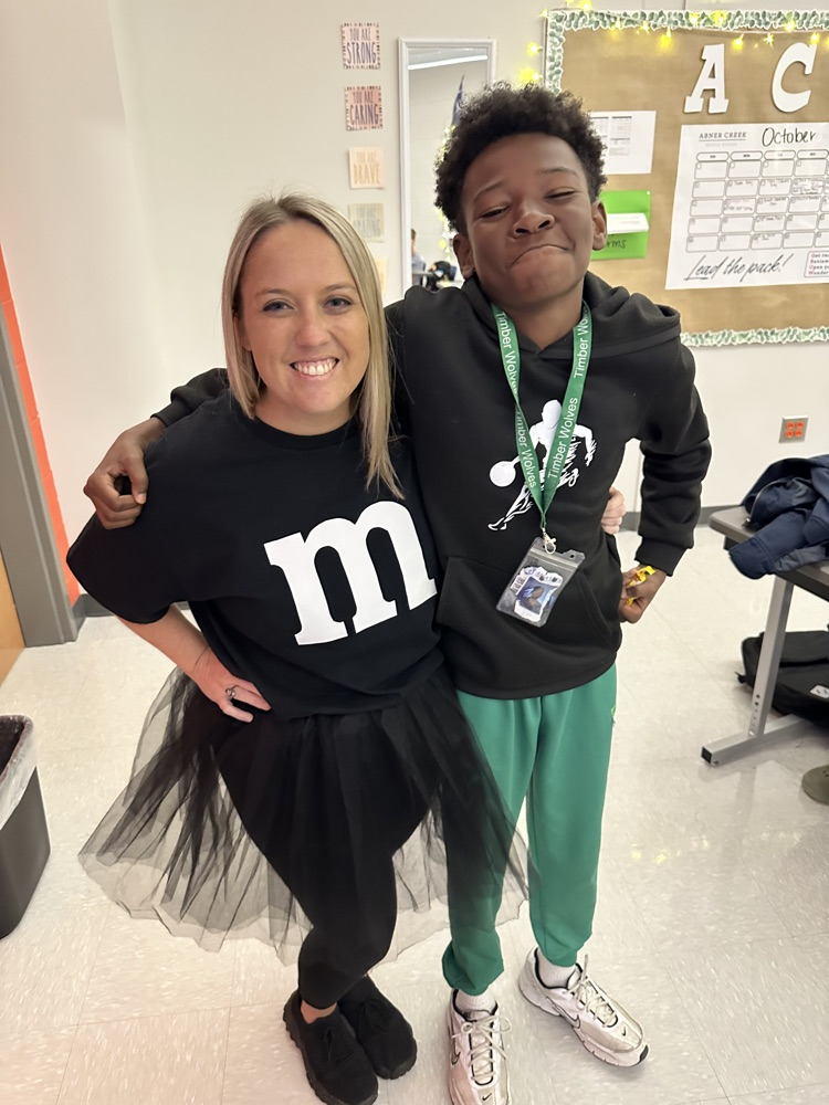 kids and teachers wearing house colors