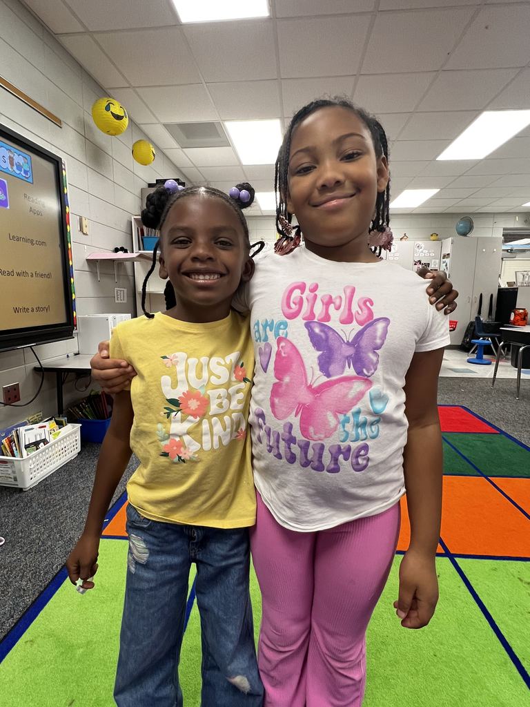 students wearing shirts with positive messages