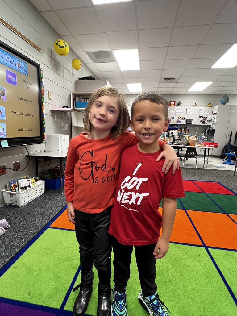 students wearing shirts with positive messages
