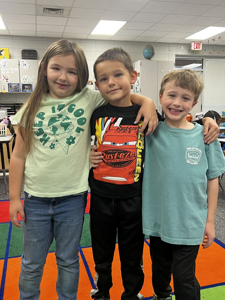 students wearing shirts with positive messages