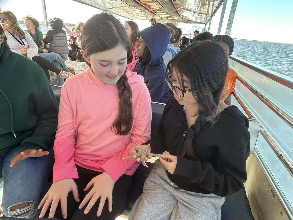 student seeing starfish