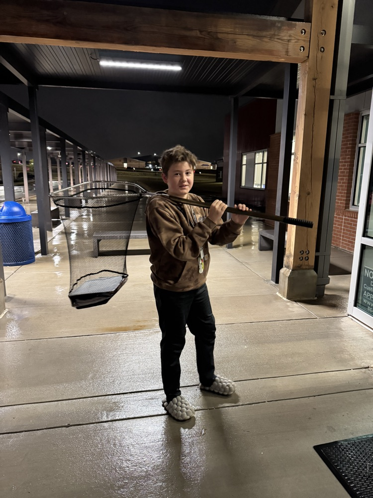 kids with funny items carrying their books