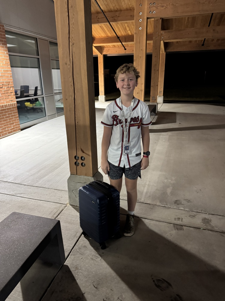 kids with funny items carrying their books