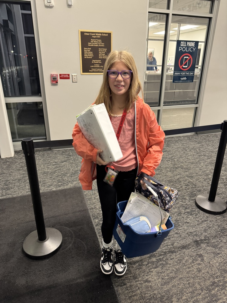 kids with funny items carrying their books