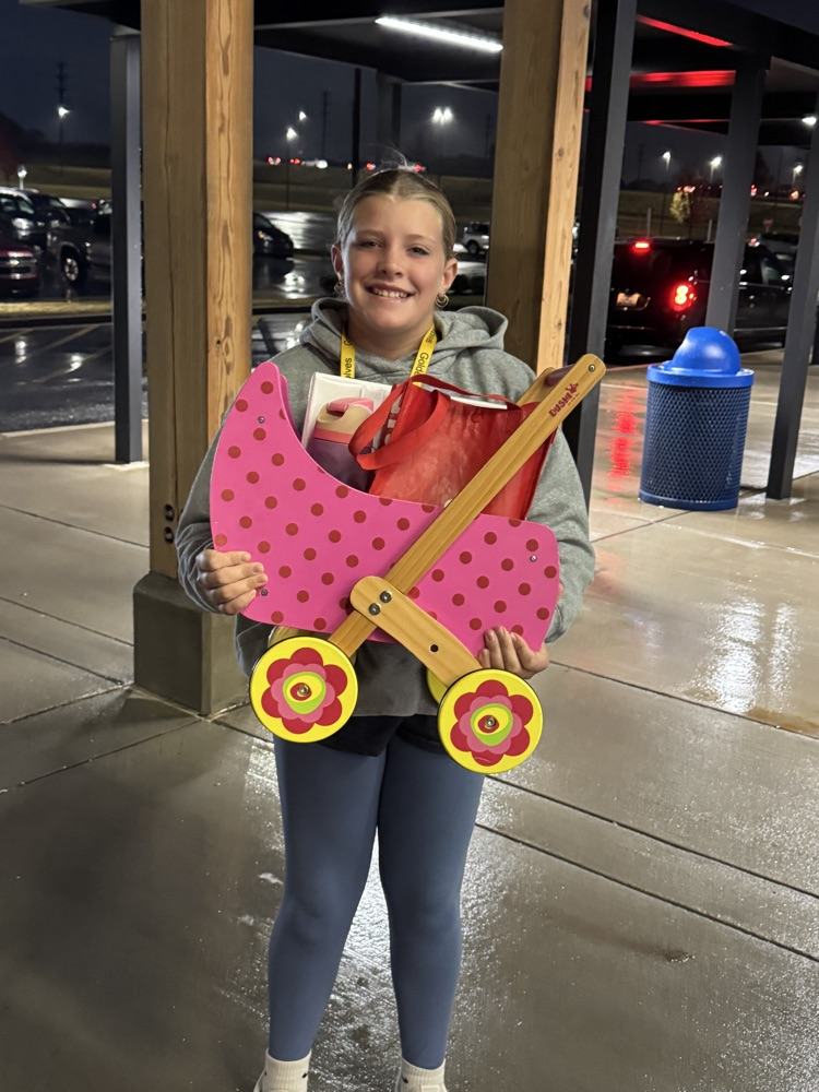 kids with funny items carrying their books