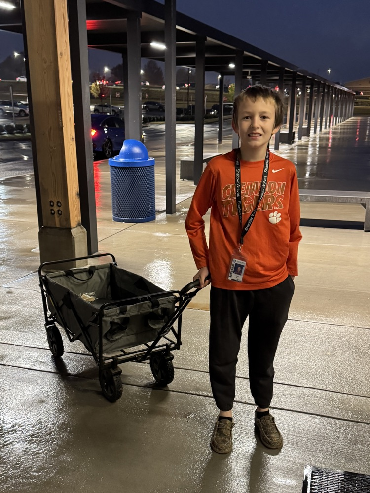kids with funny items carrying their books