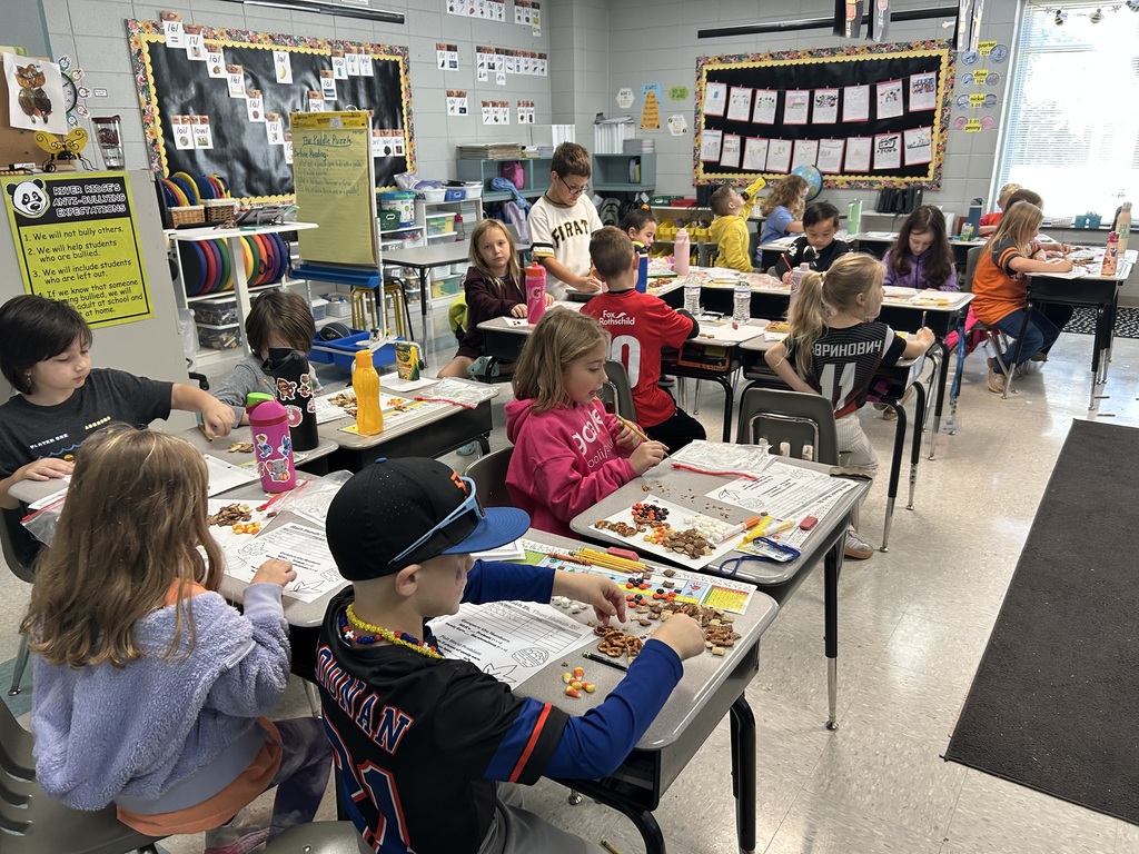 It’s Munch and Math time in Mrs. Bembenek’s class! Each student received a snack mix to sort, count, tally and compare. Math is delicious!!