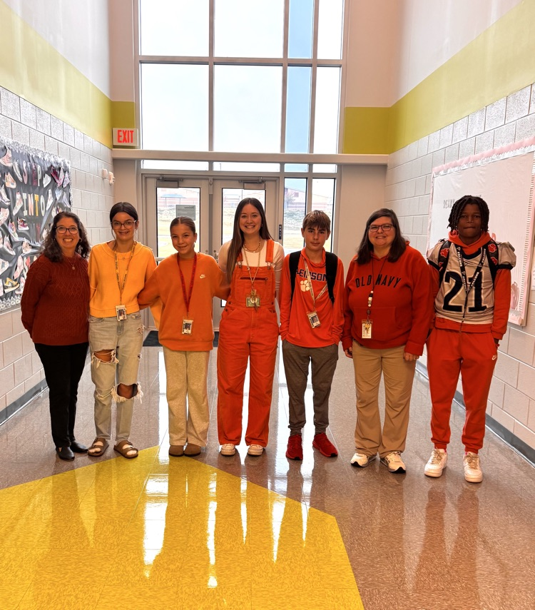 kids and teachers dressed in orange