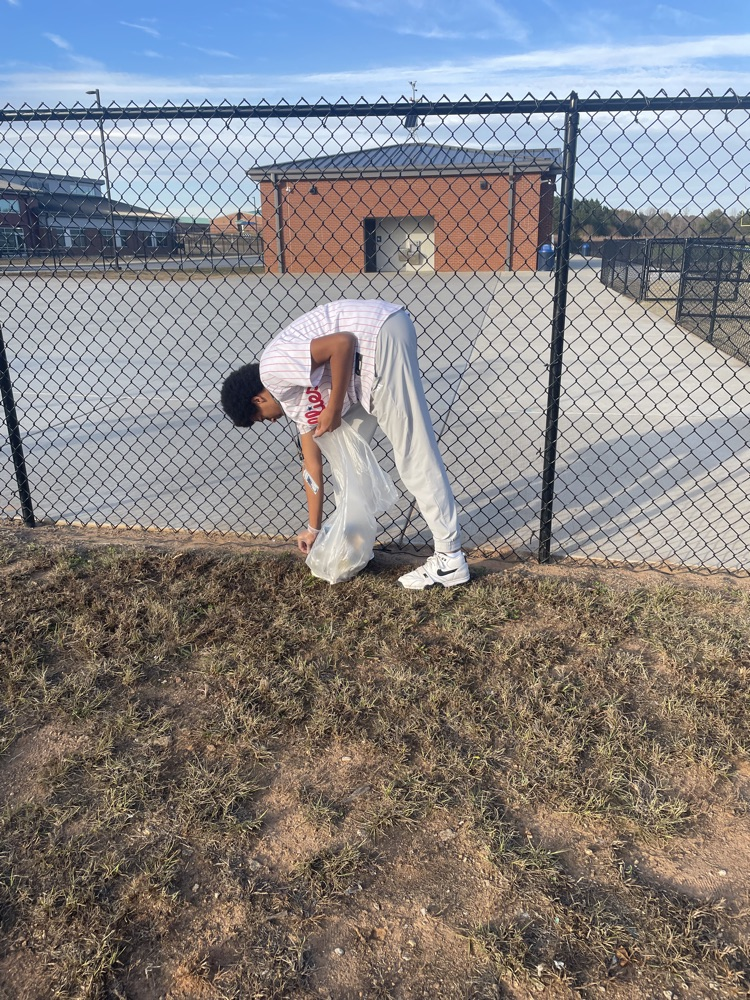 beta club members cleaning up