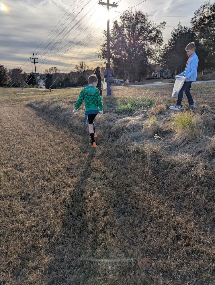 beta club members cleaning up