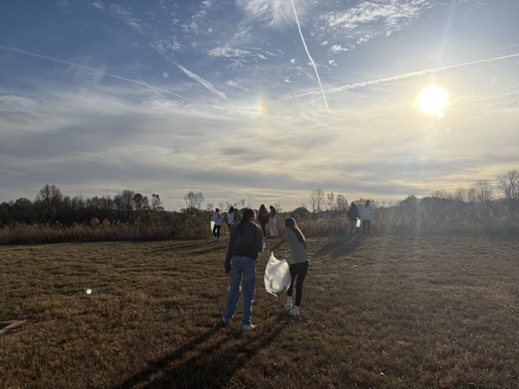 beta club members cleaning up