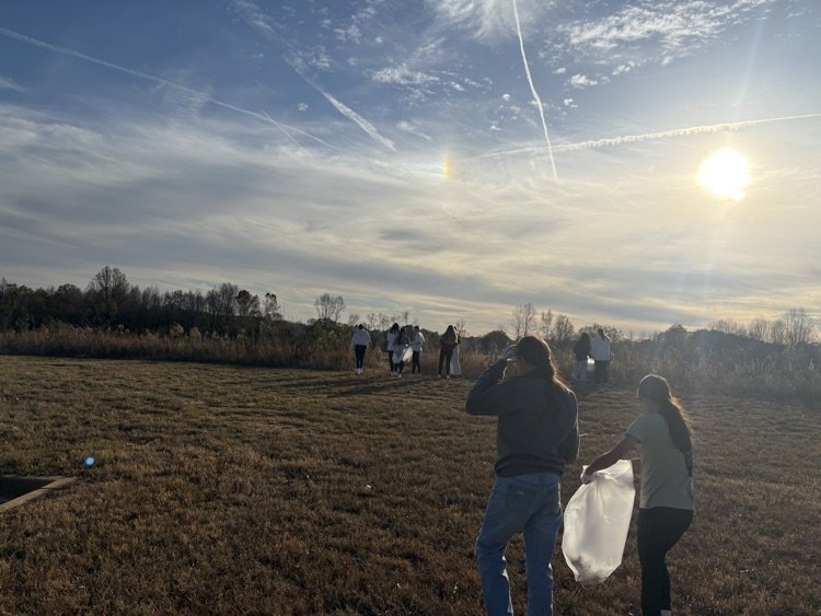 beta club members cleaning up