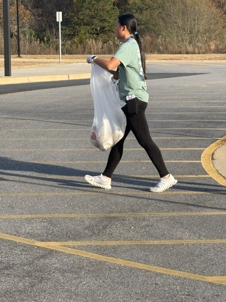 beta club members cleaning up