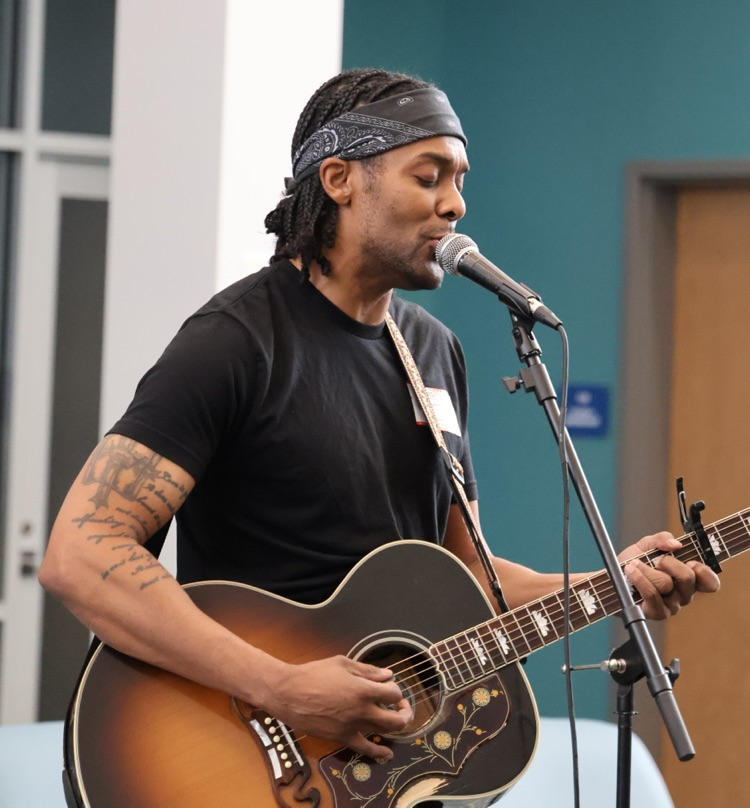 musician playing guitar 