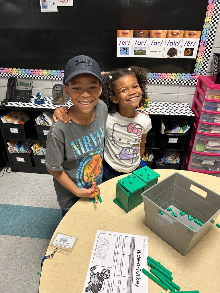 Mrs. Cloonan's class reviewed place value by building turkey forts out of base ten blocks and determining the value of their completed fort.