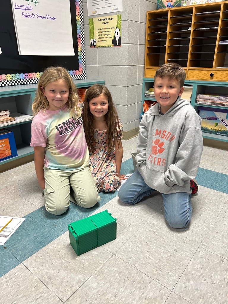 Mrs. Cloonan's class reviewed place value by building turkey forts out of base ten blocks and determining the value of their completed fort.