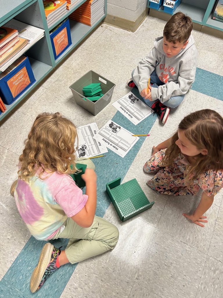 Mrs. Cloonan's class reviewed place value by building turkey forts out of base ten blocks and determining the value of their completed fort.