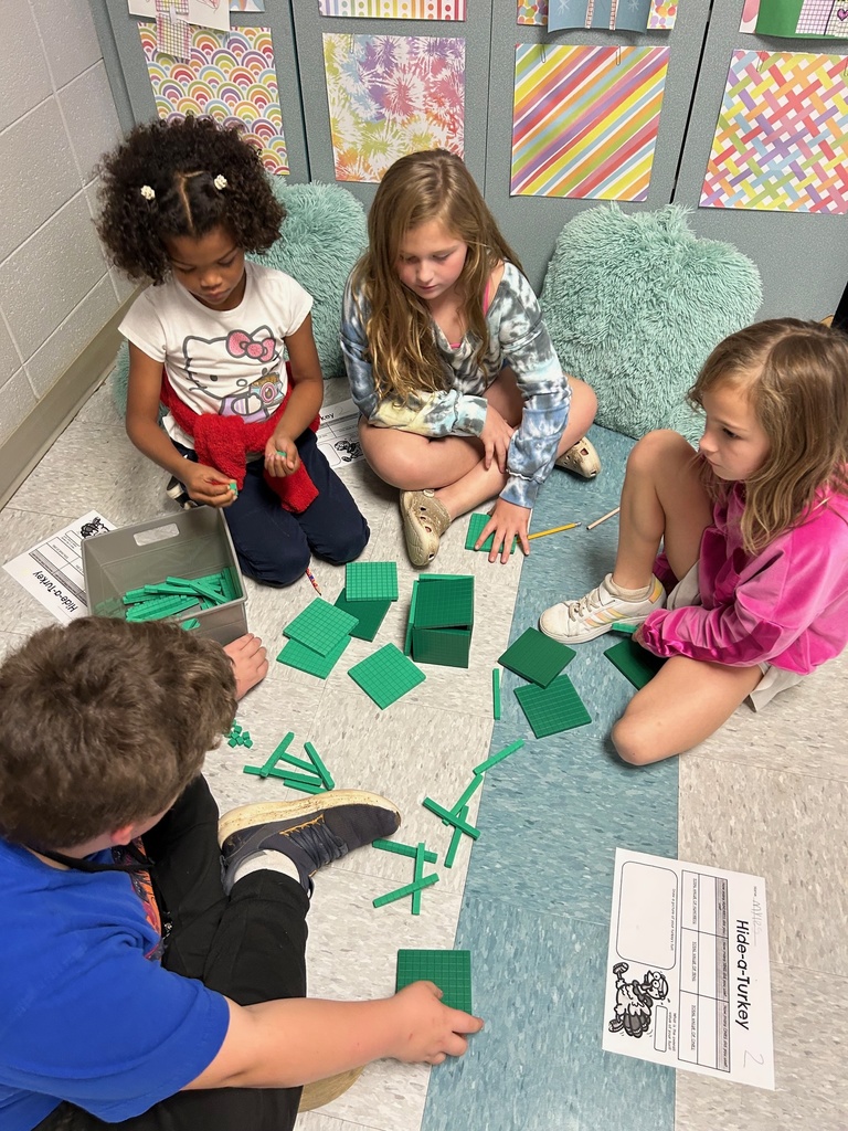Mrs. Cloonan's class reviewed place value by building turkey forts out of base ten blocks and determining the value of their completed fort.