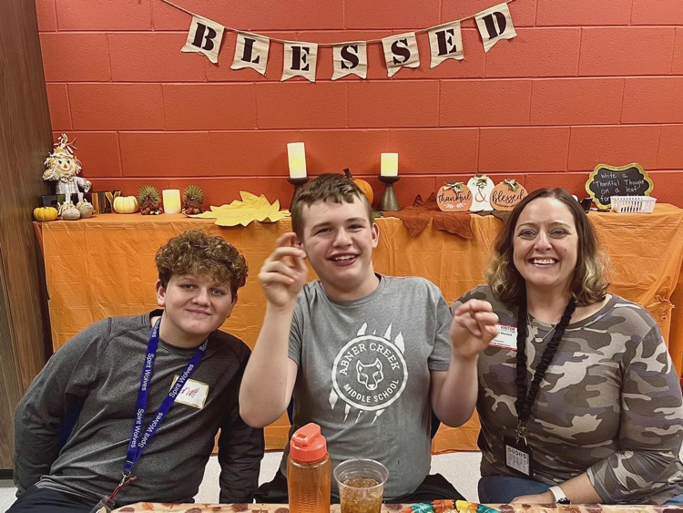 kids and adults at thanksgiving party 