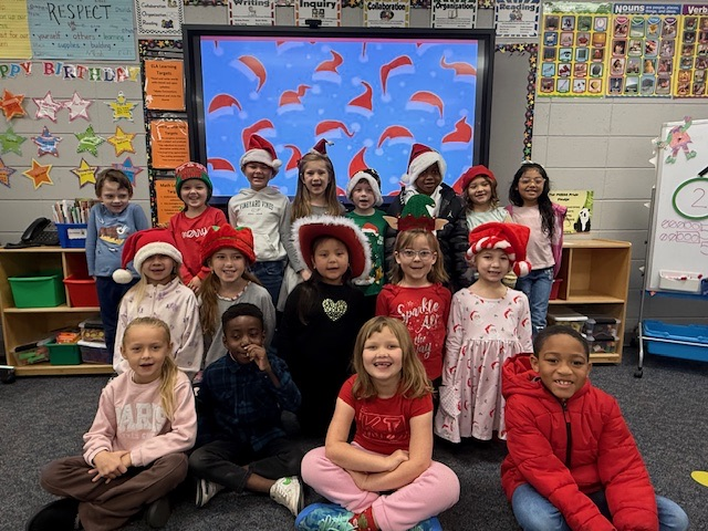 students wearing holiday headgear