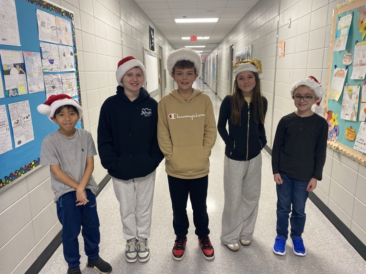 students wearing holiday headgear