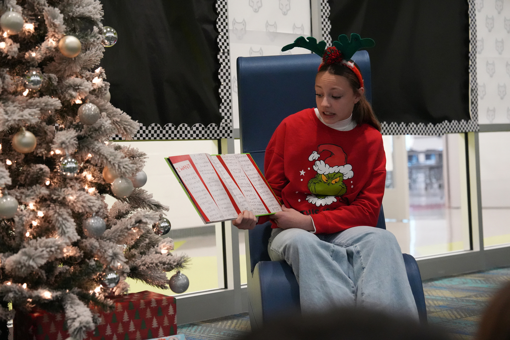 student reading book