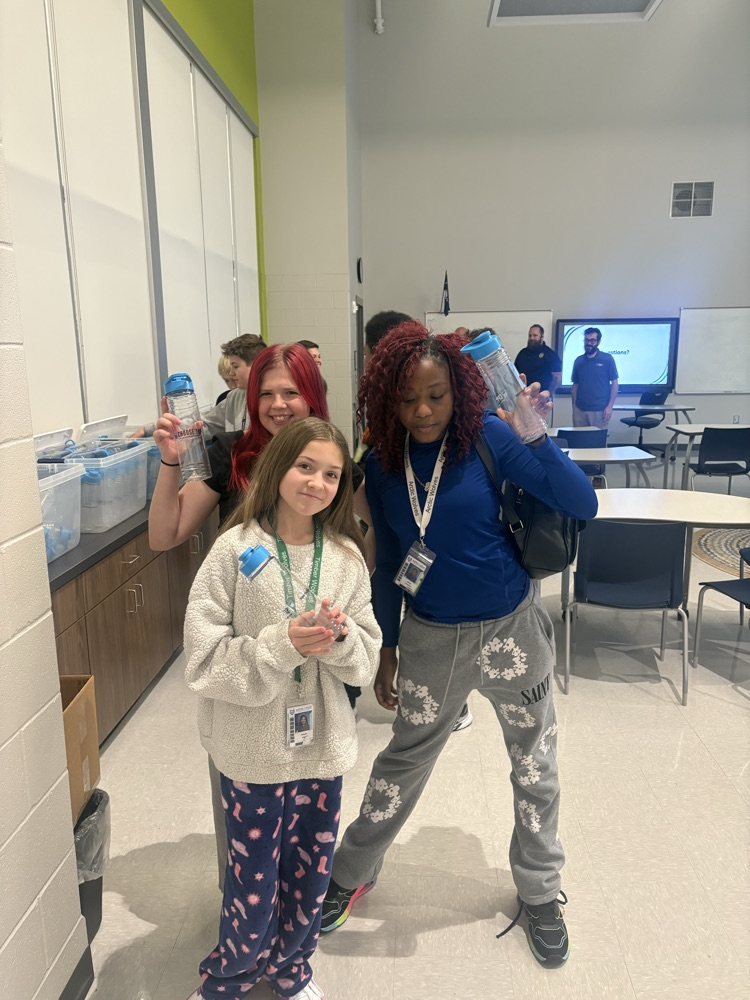 Spartanburg water employees with students