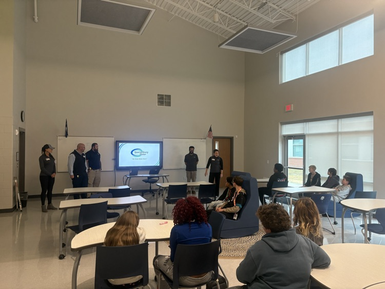 Spartanburg water employees with students