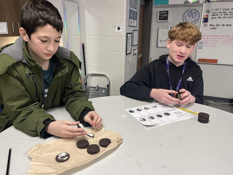 kids with Oreos and moon phases 