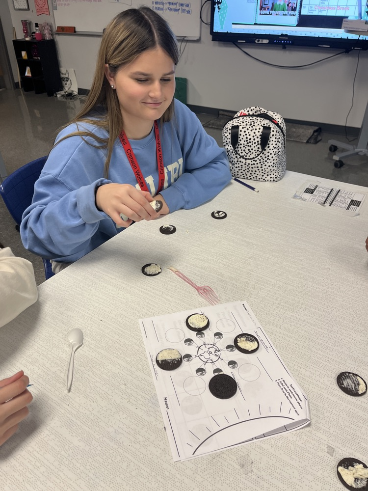 kids with Oreos and moon phases 
