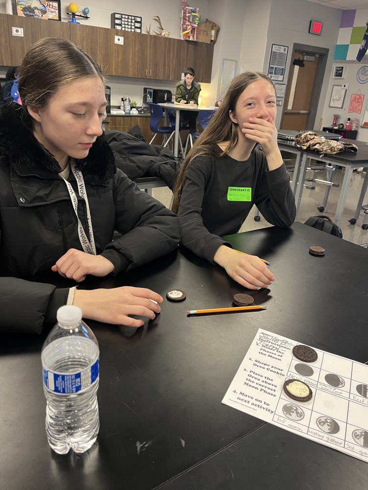 kids with Oreos and moon phases 