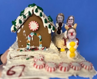 teachers participating in a ginger house decorating contest