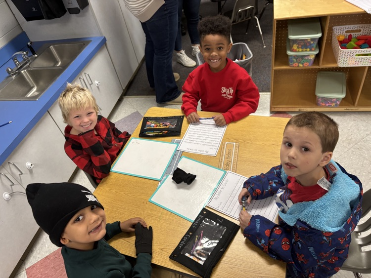 students writing letters