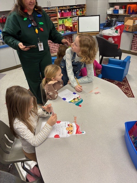 Mr. Jackson’s class came to help Mrs. Odom’s class write letters to Santa and eat candy canes! 