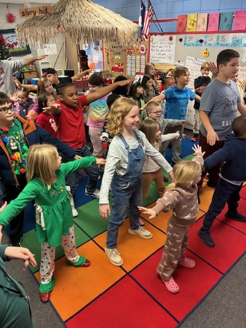 Mr. Jackson’s class came to help Mrs. Odom’s class write letters to Santa and eat candy canes! 