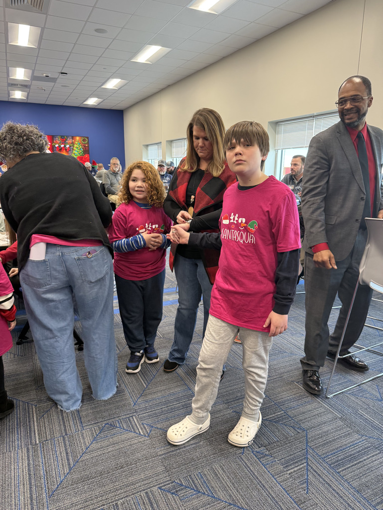 Ms. Taylor and Mrs. Cleveland’s did their annual Christmas Caroling at the District Office Christmas party. 