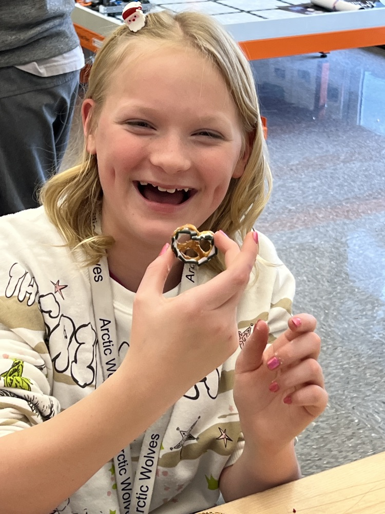kids making gingerbread houses