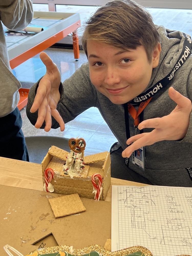 kids making gingerbread houses
