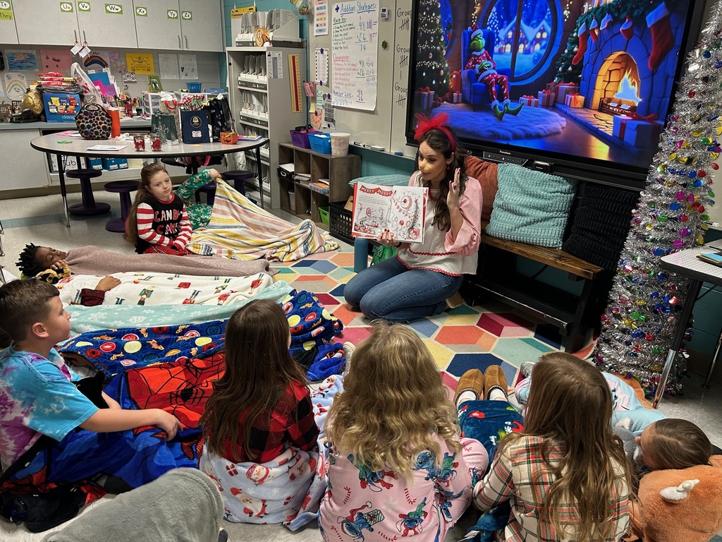Mrs. Cloonan's class enjoyed listening to "How The Grinch Stole Christmas" with a Who from Whoville on Pajama Day!