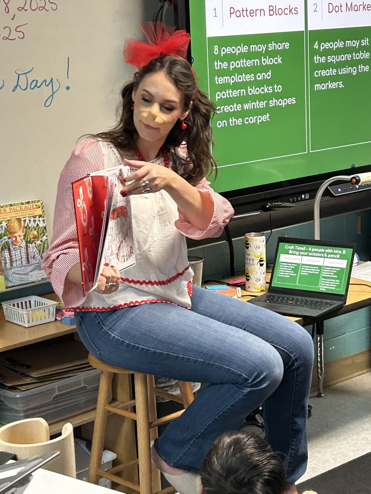  A special guest from Whoville reading How the Grinch Stole Christmas