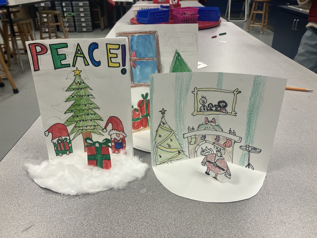 After the Holiday Card Contest judging was complete, Mrs. Goode's art students used their holiday card entries to create these amazing dioramas!  Love their holiday cheer!   