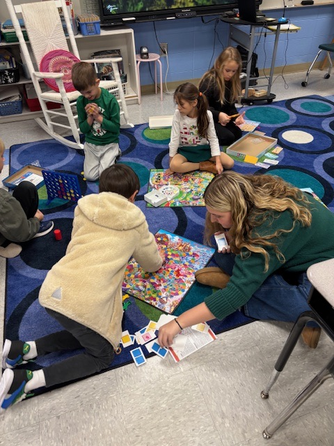 Today we had a special reader, Addie Huss. She shared, “The Night Before Christmas.” Then she stuck around to play board games with the class. 