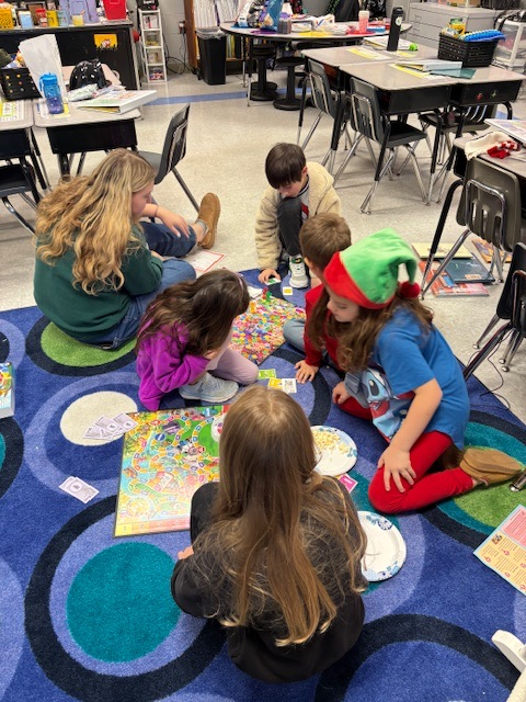 Today we had a special reader, Addie Huss. She shared, “The Night Before Christmas.” Then she stuck around to play board games with the class. 